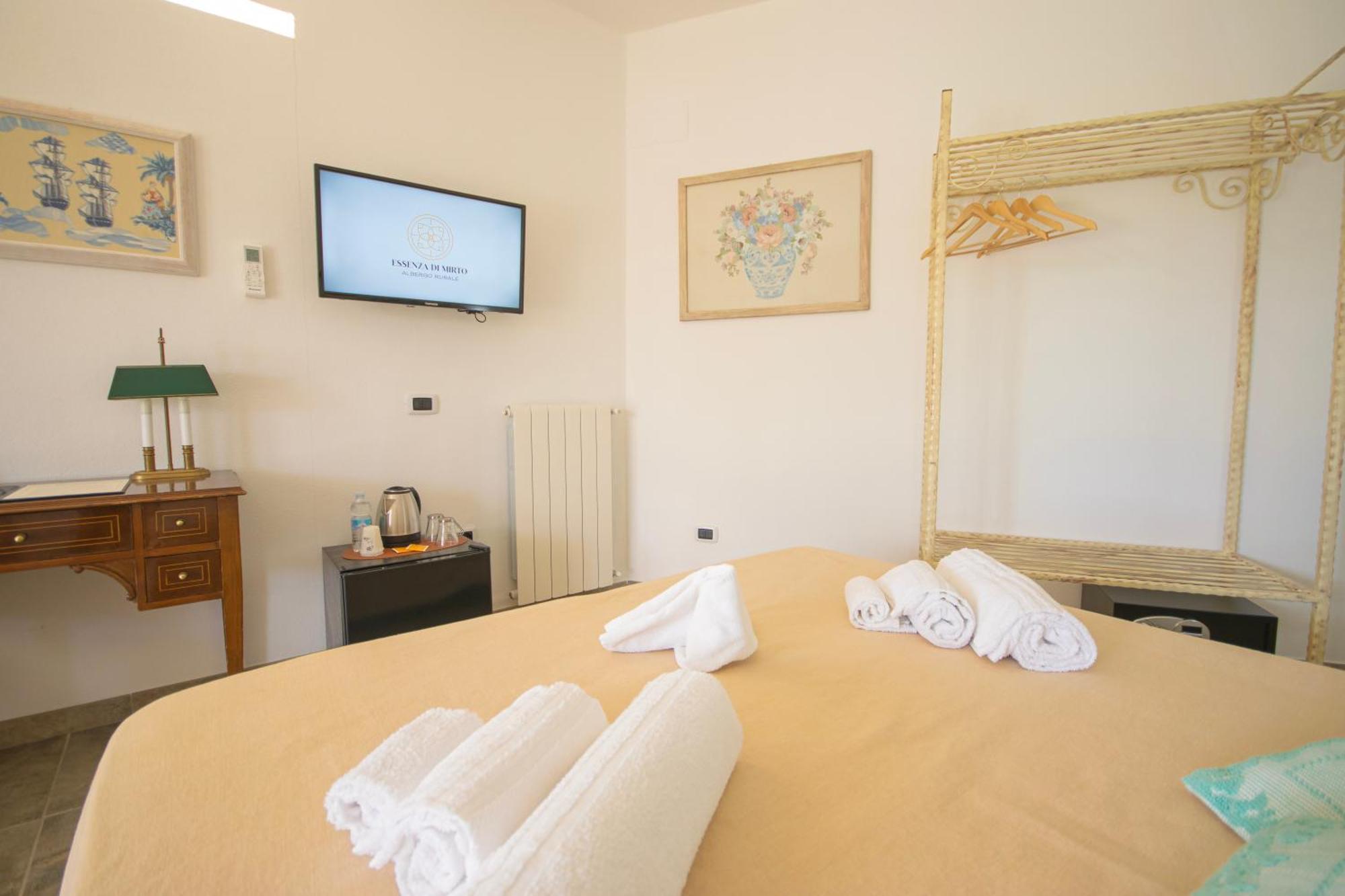 Hotel Essenza Di Mirto La Caletta Phòng bức ảnh