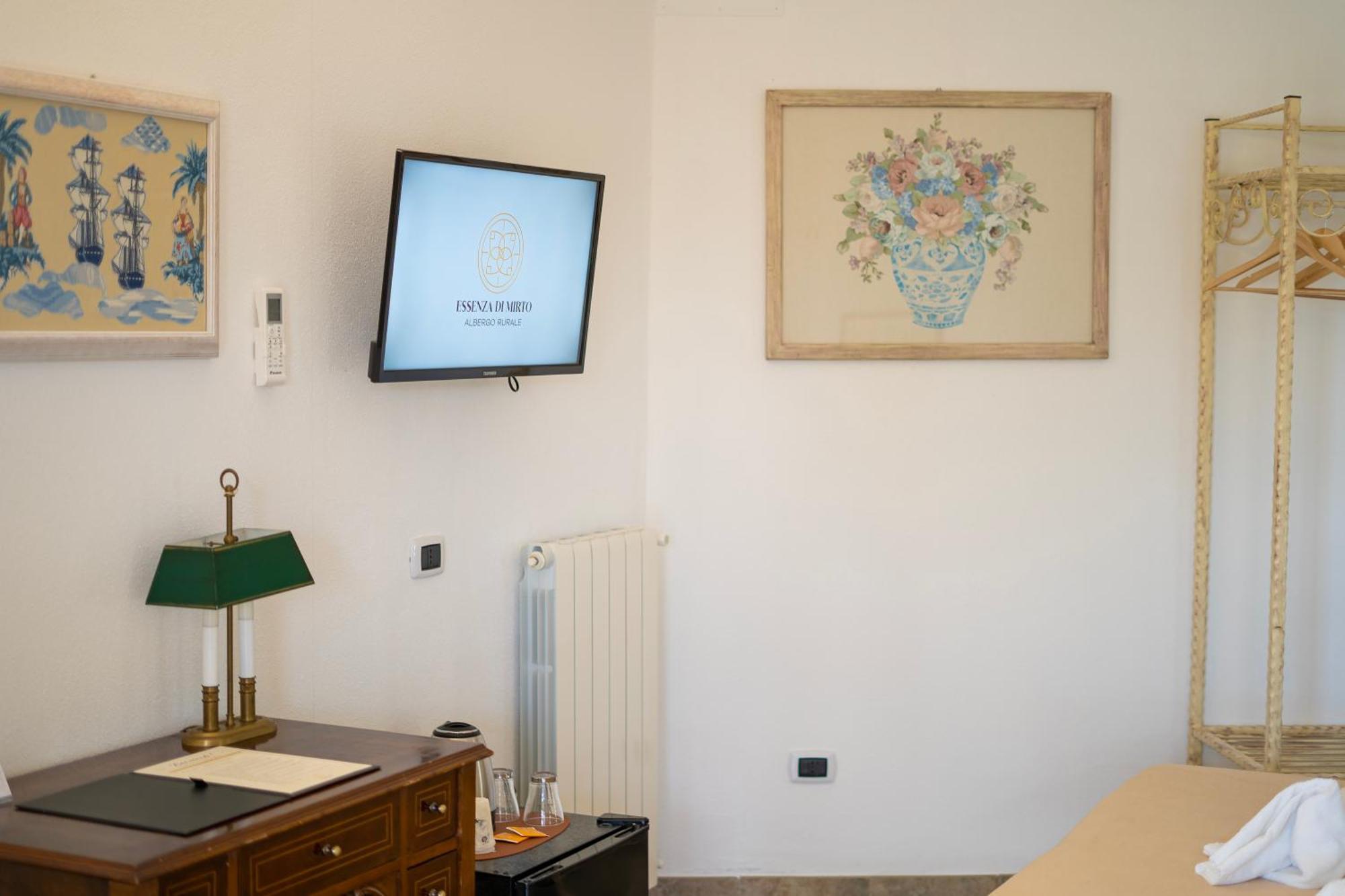 Hotel Essenza Di Mirto La Caletta Phòng bức ảnh