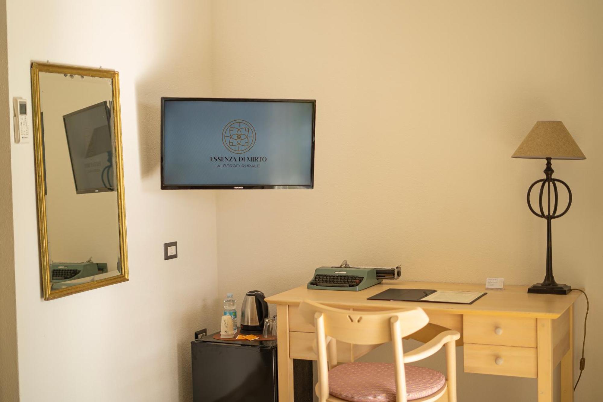 Hotel Essenza Di Mirto La Caletta Phòng bức ảnh