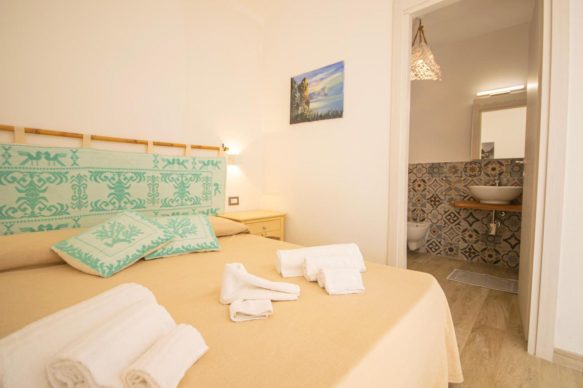 Hotel Essenza Di Mirto La Caletta Phòng bức ảnh